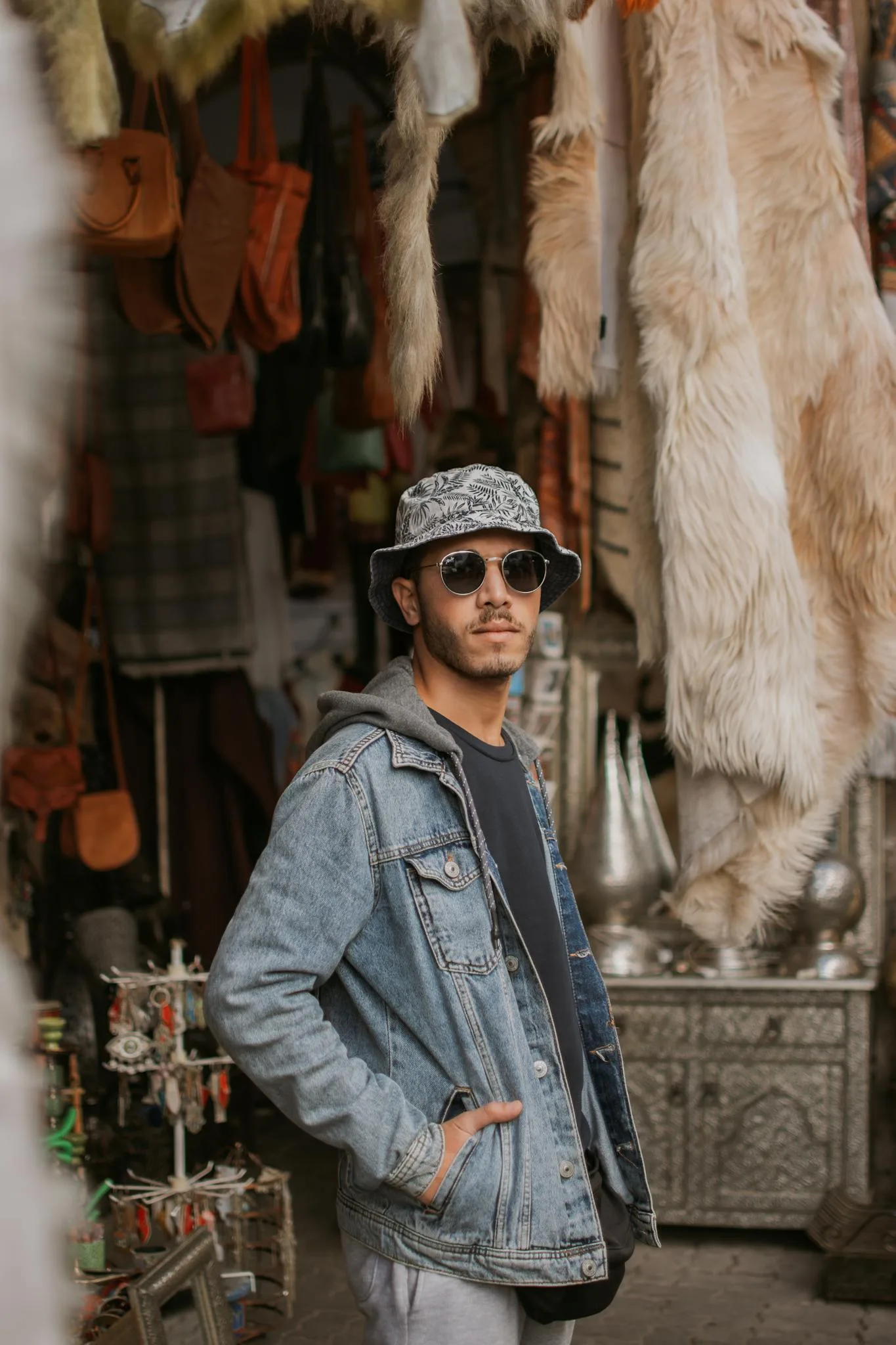 a man in a hat and sunglasses 1